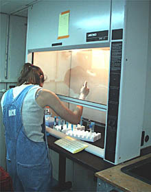 Tim Shank checks the push cores. Scientists will use these cores to sample the hydrothermal mud from the seafloor in the Guaymas Basin. 
