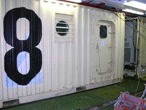 The van containing dive gear has been lowered into the Gould�s hold and chained down. (Photo K. Madin, WHOI)