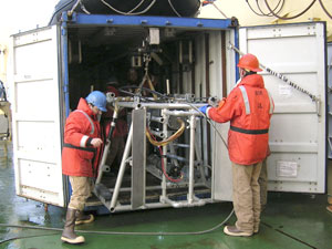 LAPIS leaves its van, escorted by Josh (left) and the cruise�s Marine Projects Coordinator (MPC) Eric Hutt. (Photo by Diane DiMassa, Massachusetts Maritime Academy) 
