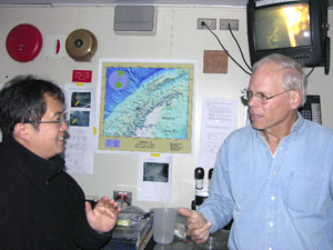 Jun Nishikawa (left) and Larry Madin are excited about possible future uses of the LAPIS system for remotely seeing real-time behavior of planktonic animals. (Photo by Kate Madin, WHOI)