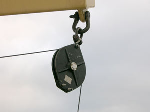 A daytime view of the block that fell, carrying the winch wire with it.