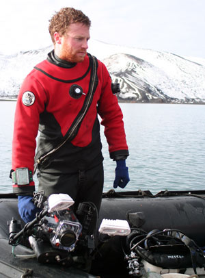 Jeff Mercer prepares to dive in Whaler’s Bay, Deception Island. (Photo by Brenna McLeod, Trent University)