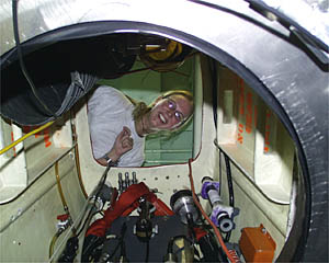 Julie Barber prepares to climb down into Alvin for a briefing. 