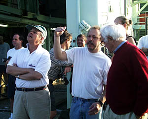 Dana discusses today’s dive plan with Lou Cabot while Bob James and other members of the science party wait for the launch. 