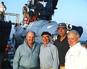As Alvin is prepared for today's dive, Bob, Lou Cabot, Dan Stuermer and Gary pose for a group photo. 