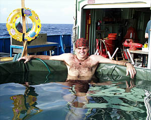  Now that the camera tows have been working well, Greg is happy to be able to enjoy a few minutes in the pool during the day. His fading tan is one bad side effect that comes with being a "night owl."
