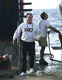 Capt. McGee after getting out of Alvin is holding his frozen shoes! Can you guess what will happen next? 