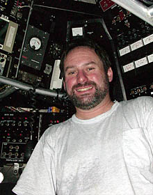 Alvin pilot Bob Waters takes a break from driving the sub during Dive 3528. 