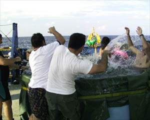 ...by throwing Dave into the swimming pool.  