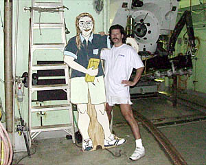 Blee Williams posing with the painted plywood cut-out of Dave Olds that will be placed on the seafloor during Dive 3531 today. 