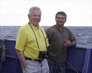 Gary Comer (left) and Captain George Silva watch the launch.