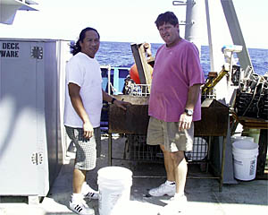 Jay and Jockie prepare for tonight’s barbeque.