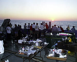 The group enjoys the end of a great day and a glorious sunset. 