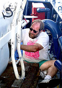 Bob Elder putting the finishing touches to the DSL-120 sonar before it was lowered for the second time this morning. Bob was looking forward to the vehicle working so he could get some sleep after being up all night.