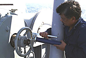 Reynaldo Esteban lubricates an axle on the ship’s hydrographic winch. Keeping all equipment working well is an important part of running a research ship at sea. We will be using this winch next week to get deep-sea rock samples with the rock corer.