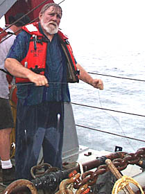It rains in the tropics! As you can see, Tom and his transponder crew got very wet this morning when a heavy rain squall passed over the ship.