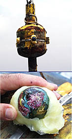 Dan puts one of Josh Simpson’s “Planets” on the rock corer (stuck into the surfboard wax) to send it down to rest among the glassy pillow basalts of the young lava flow that we have discovered in this area. 