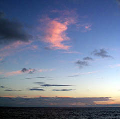 The skies have been clearing today and the seas are flattening out as the sun sets on another beautiful day at sea.