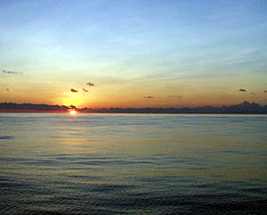 Another beautiful tropical sunset. The last few nights we have seen a “green flash” caused by the refraction of the sun’s rays as it dips below the flat horizon. It is very illusive, and some people don’t believe it even happens! We’ll try to capture it in a picture to show you. 