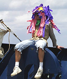 The job of the Royal Hoser (Captain Eric Buck) is to keep the Pollywogs cool by hosing them off with the fire hoses!. Here he waits for the festivities to start.