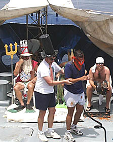 The Royal Public Defender (Dan Scheirer) leads Jon Burgess away from the Royal Court to face his fate! 