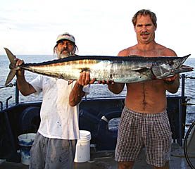 The “Daves” (Murline, right and Grimes, left) show off the Wahoo they caught on the way back to Academy Bay, Santa Cruz Island. It weighed 30 pounds and we are looking forward to having it for dinner tomorrow! 