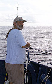 Dave Grimes sets out his rod and a hand line to see if the fish are biting today. After a hard day’s work on R/V Melville, Dave enjoys fishing. 