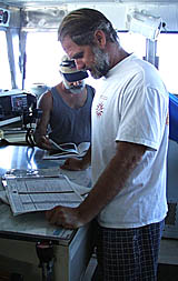 Dave Murline on the Bridge of R/V Melville with his fishing partner Dave Grimes (background) who is the AB (Able-Bodied Seaman) on Dave&rsquo;s watch. 