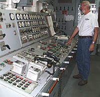 Ron at the Engine Control Center (ECC)&mdash;the place where all the dials and controls for the Engine Room are located. These allow the engineers to check and control all the different equipment on the ship from this one location.