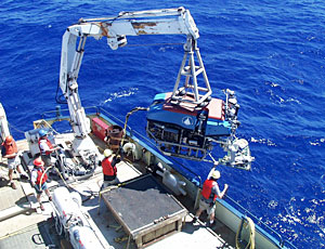It takes the help of a half dozen crew members and one of the ship’s cranes to lift the 2,200 pound vehicle over the side.  