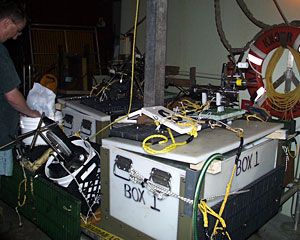 Chemist Darryl Green checks his equipment just before the elevator heads back down to the seafloor.  