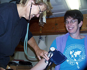 Ship medic Janet Costello organized a free blood pressure clinic today. Happy with her pressure results was microbiologist Colleen Cavanaugh.  