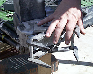 ROV Jason’s manipulator arm has a moveable claw that is used for many different tasks including grasping sample bottles, picking up rocks, and deploying and retrieving equipment on the seafloor. 