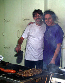 Cook Chris Poulin and Steward Mirth Miller used team work to prepare the tasty grilled treats. 