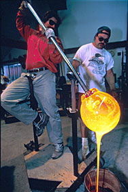 Molten glass drips from a completed Planet.  