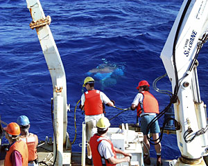 ROV Jason dips beneath the waves for its final trip to the Edmond Vent Field.  