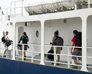  Scientists coming on board R/V Roger Revelle. From left they are: Ben Grosser, Kate Buckman, JJ Becker and Jeremy Haney.  