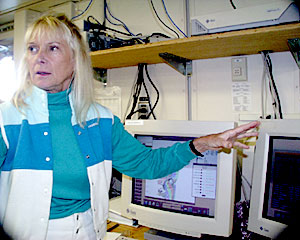 Uta Peckman demonstrates how to operate the multibeam sonar system to the scientific party. 