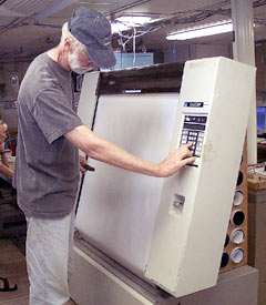 Printing out up to date maps is an important job at sea, here Dan Jacobsen prepares the printer to plot out the data for an area we mapped using the multibeam sonar.  