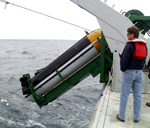  Captain Chris Curl supervises the recovery of the MR1 sonar fish. 