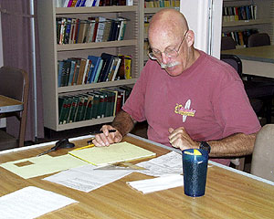  Gene Pillard, the Scripps Res. Tech, doing paperwork in the galley. Part of his job entails not only helping us but preparing for subsequent science programs on Revelle later this year. 