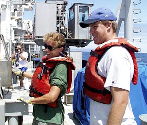  Karen Harpp (left) and Rob Otto operate the A-Frame controls when bringing in the dredge this morning.  