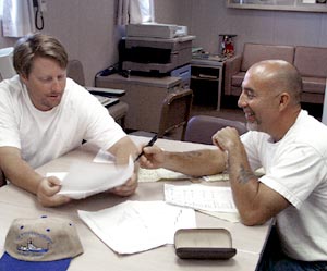 Eric Wakeman, Chief Mate, and Victor Barnhart, Bosun, go over the ship’s inventory. Having the right equipment and spare parts on board can make all the difference to a successful expedition. 