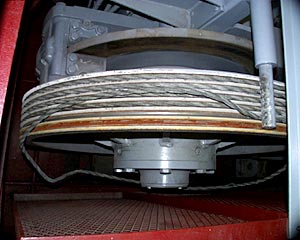 The traction winch keeps the trawl wire taunt. When the wire broke, the slack traveled up like a rubber band and caused the wire to jump out of its groove. 