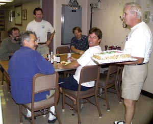  Ed Miller presents Dan Fornari with his birthday cake. Happy birthday Dan! 