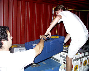 Packing has begun. Josh Curtice (right) and Ben Grosser load the van that will be shipped by sea-freight back to Woods Hole from Costa Rica. 