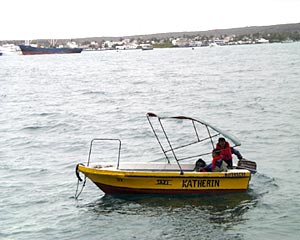  The panga arrives to take eager scientists and crew to Puerto Ayora. 