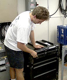  Todd Ericksen packs away one of the MR1 side scan sonar computers. 