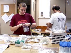  Kate Buckman and Joe Licciardi prepare and pack the biological specimens for transport back to Woods Hole. 