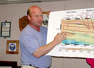 Co-Chief Scientist Tim Shank explains plans for revisiting the Gal&aacute;pagos Rift hydrothermal vent sites at a meeting of scientists held Friday evening in the ship&rsquo;s library after the ship left port.